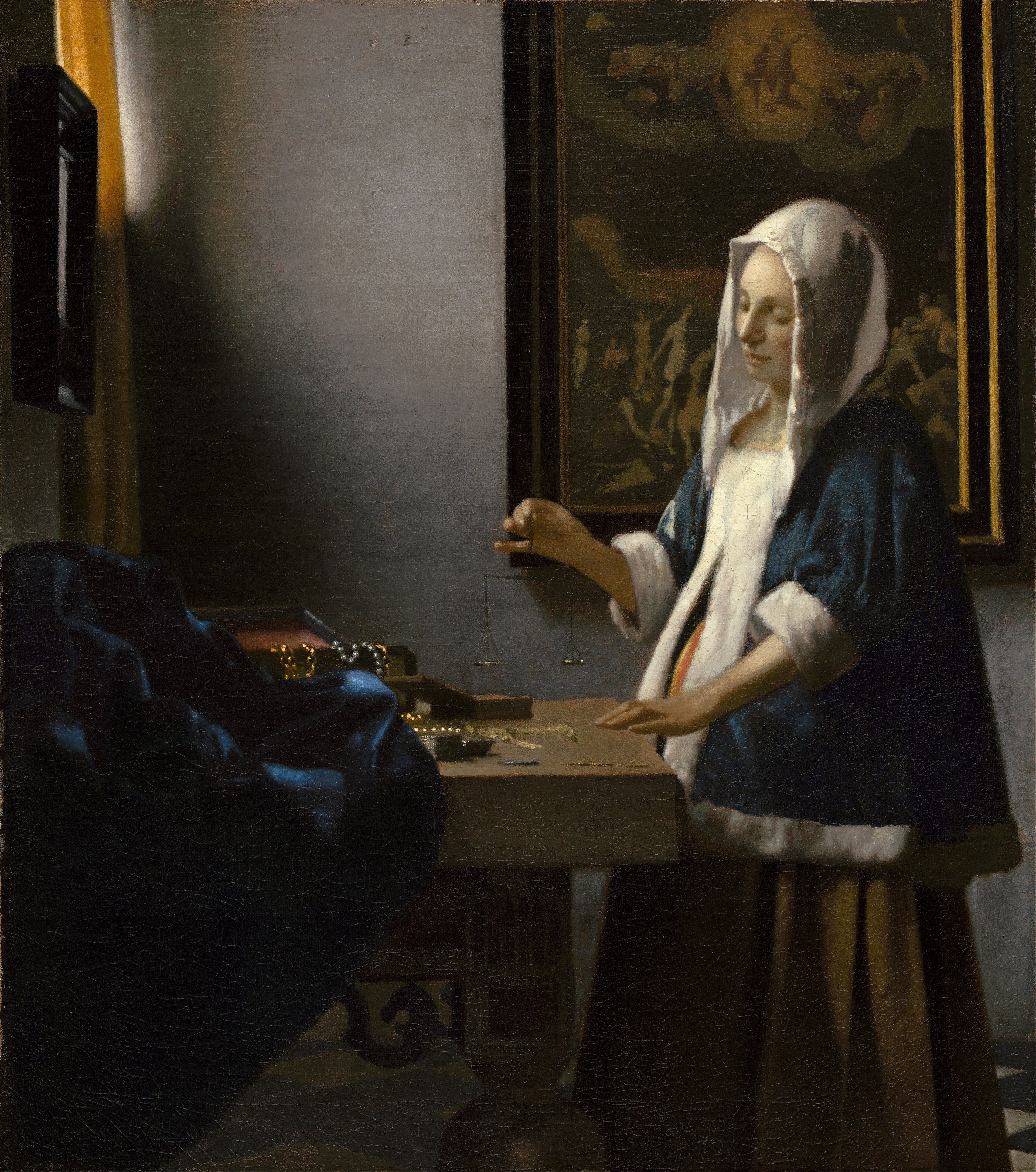 Woman Holding a Balance — Johannes Vermeer (c. 1664)