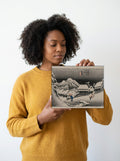 Held for scale — 10 x 8 inch canvas