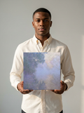 Held for scale — 12 x 12 inch canvas